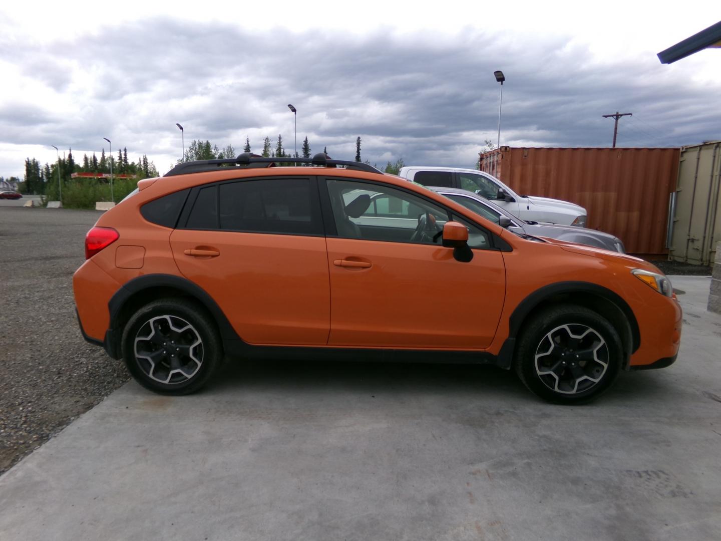 2013 orange /Black Subaru XV Crosstrek (JF2GPAGC1D2) , located at 2630 Philips Field Rd., Fairbanks, AK, 99709, (907) 458-0593, 64.848068, -147.780609 - Photo#2